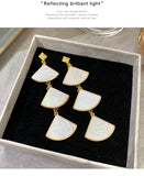 スカラップシェルロングイヤリング YN3021