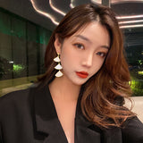 スカラップシェルロングイヤリング YN3021