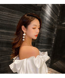 スカラップシェルロングイヤリング YN3021