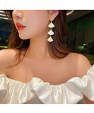 スカラップシェルロングイヤリング YN3021