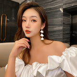 スカラップシェルロングイヤリング YN3021